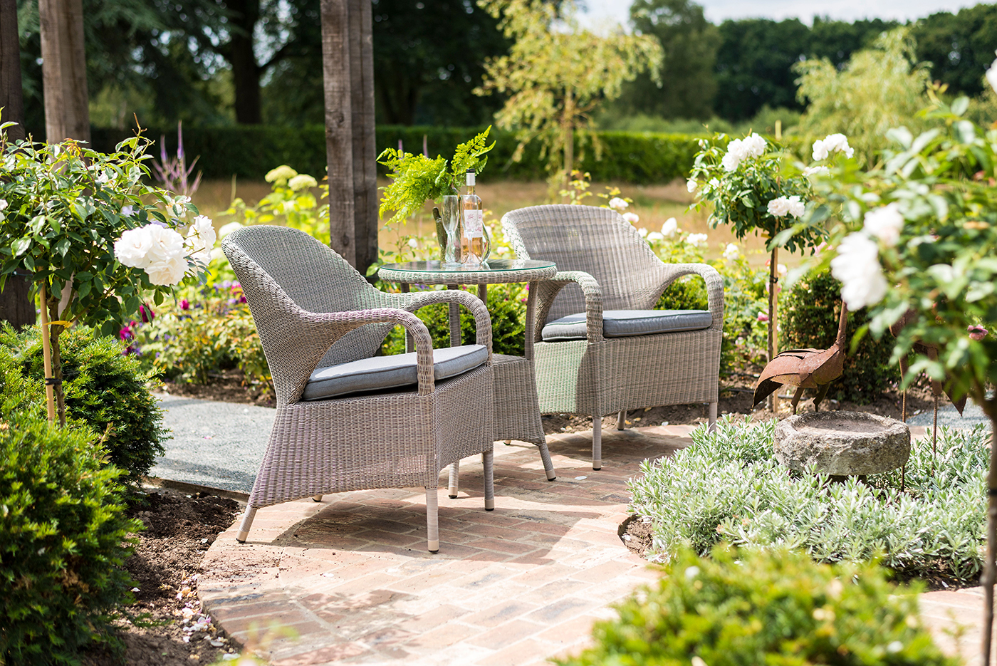 4 Seasons Outdoor Sussex Stacking Bistro Set in Polyloom Pebble Weave