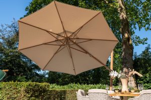 4 Seasons Outdoor Siesta Premium 35m Round Sand Wood Look Frame Parasol with 125kg Granite Base and Wheels | Garden Furniture Online